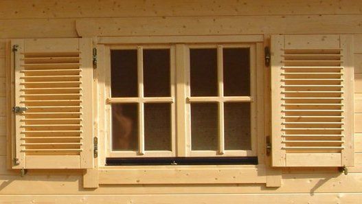 Wooden house shutters
